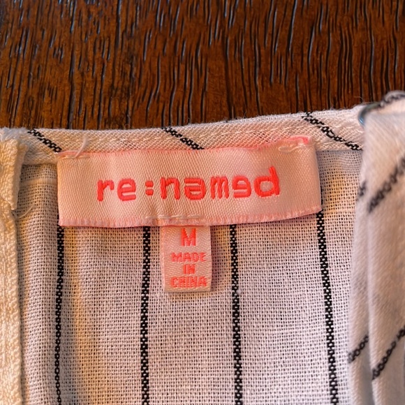 Crop top. White with black pin stripes. Tie front. Zipper back. Medium - Picture 4 of 4